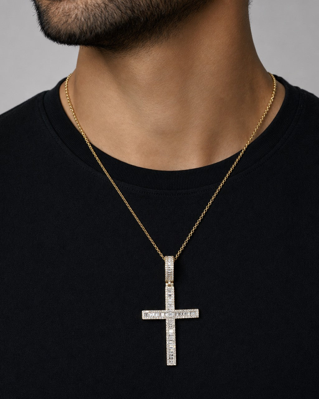 Male model wearing 10K Bold Cross Diamond Baguette Pendant