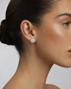 Female model wearing 14K 8.3MM Circle Diamond Earrings
