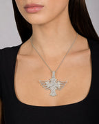 Female model wearing 10K Angel Wings Cross Diamond Baguette Pendant