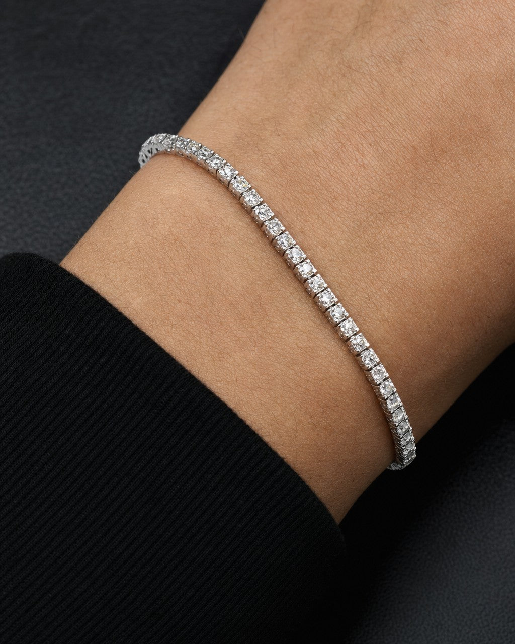 Male model wearing 14K 2MM Diamond Tennis Bracelet 7"