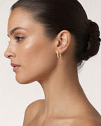 Female model wearing 14K Pavé Hoop Diamond Earrings