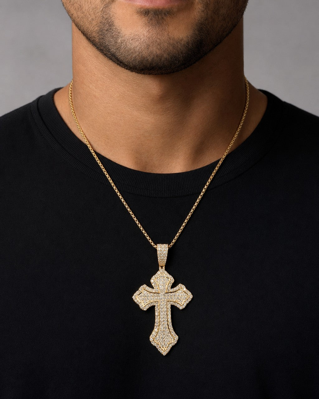 Male model wearing 14K Romance Cross Diamond Pendant