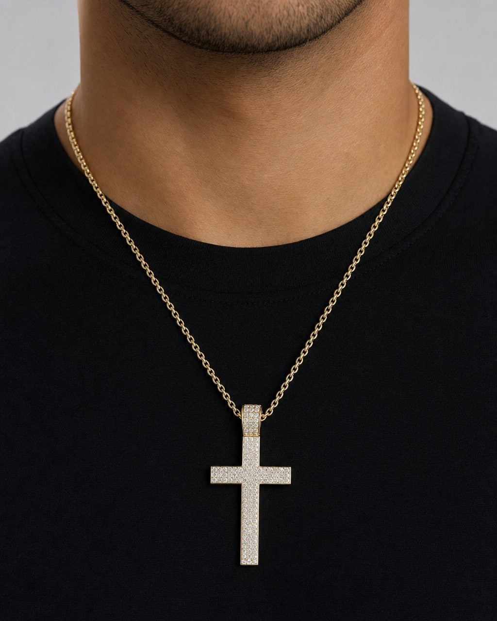 Male model wearing 10K Modern Cross Diamond Pendant
