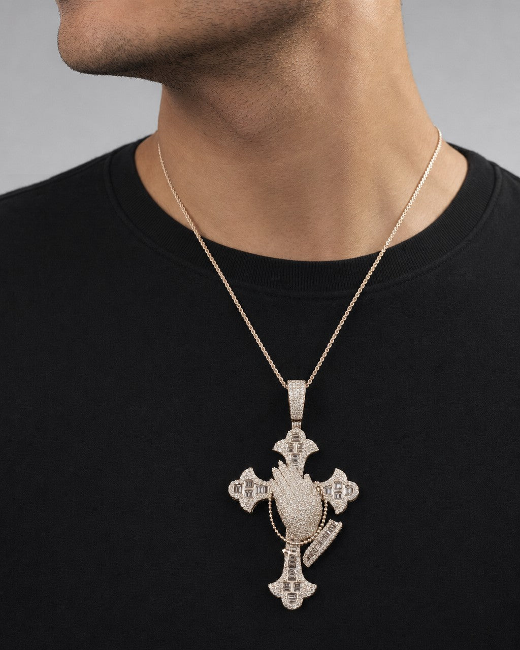 Male model wearing 10K Prayer Cross Diamond Baguette Pendant