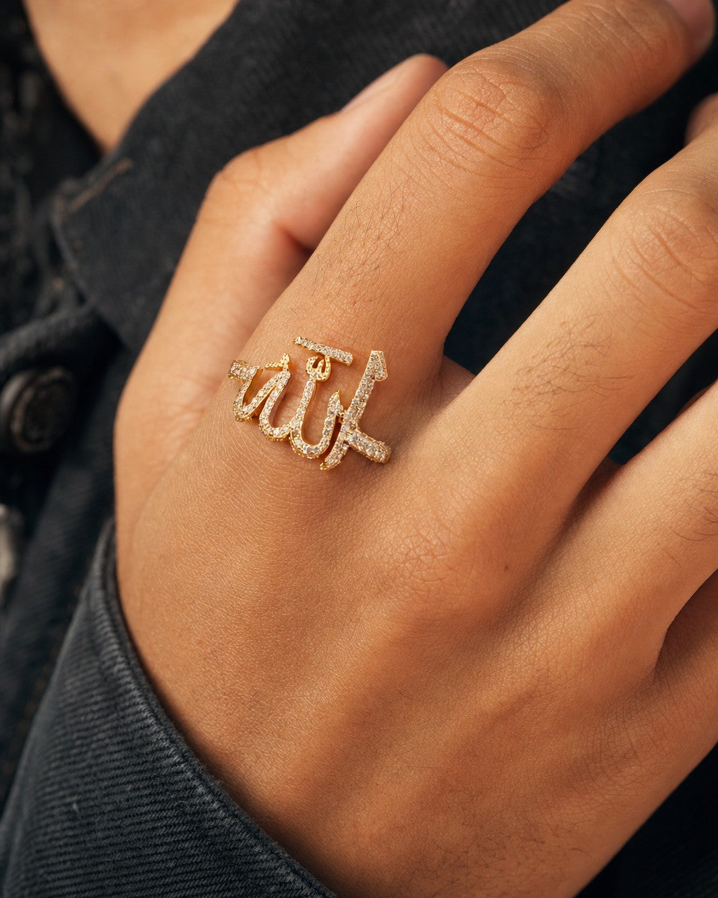 Male model wearing 14K Allah Pavé Diamond Ring