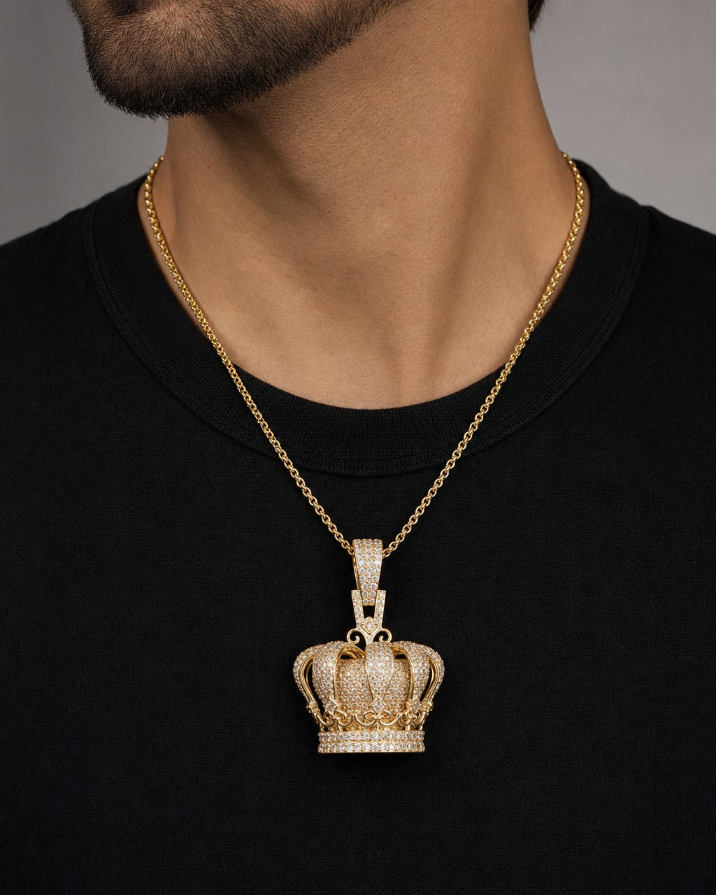 Male model wearing 10K Regal Crown Diamond Pendant