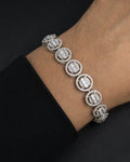 Male model wearing 10K Halo Diamond Baguette Tennis Bracelet 8"