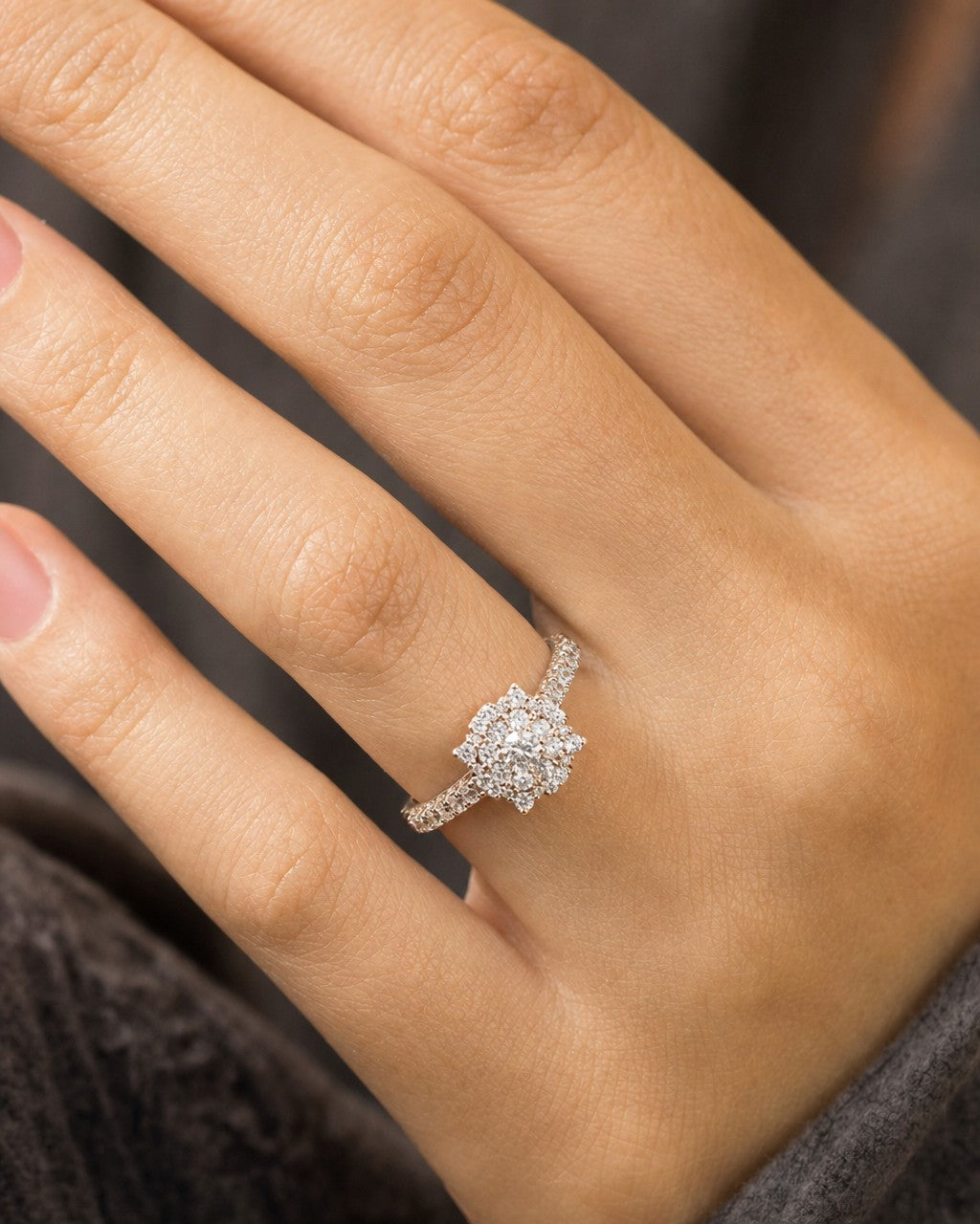 Female model wearing 14K Sydney Circle Halo Diamond Ring