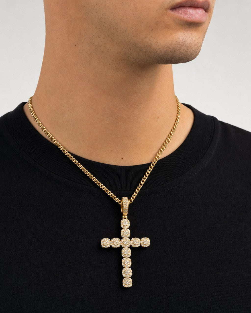 Male model wearing 10K Cross Diamond Pendant 2"