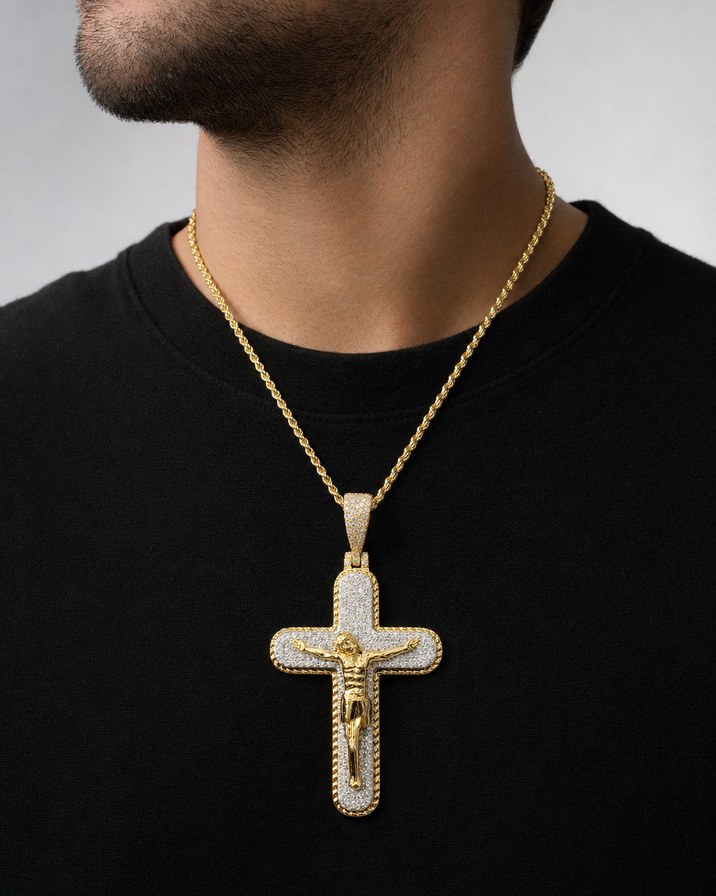Male model wearing 14K Jesus Cross Diamond Pendant