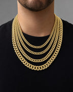 Male model wearing 14K Semi-Solid Cuban Link Chains 22-24"