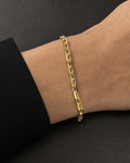 Male model wearing 14K 2.8MM Rolo Paperclip Link Bracelet 8"