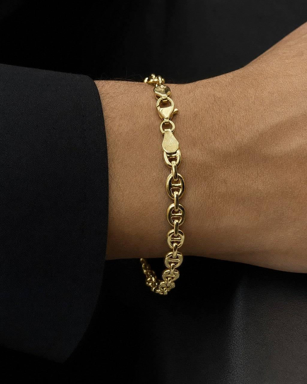 Male model wearing 14K 5.5MM Puff Mariner Link Bracelet 8"