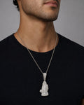 Male model wearing 10K Bless Up Praying Hands Diamond Pendant