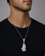 Male model wearing 10K Bless Up Praying Hands Diamond Pendant