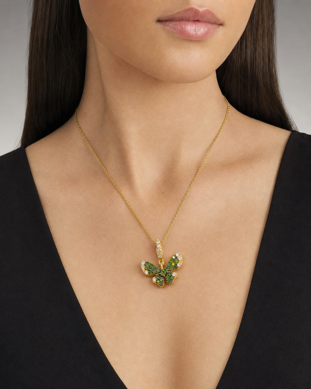 Female model wearing 14K Lucky Butterfly Diamond Pendant