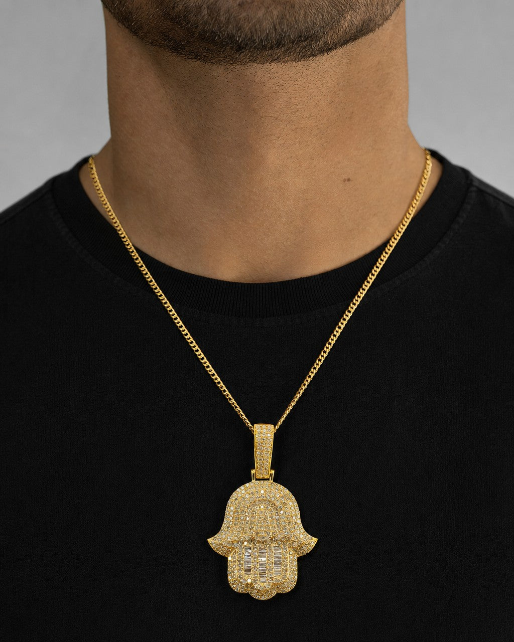 Male model wearing 14K Jumbo Hamsa Diamond Pendant