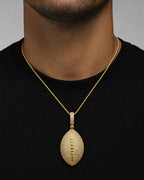 Male model wearing 10K Football Diamond Pendant