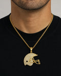 Male model wearing 10K Football Helmet Diamond Pendant