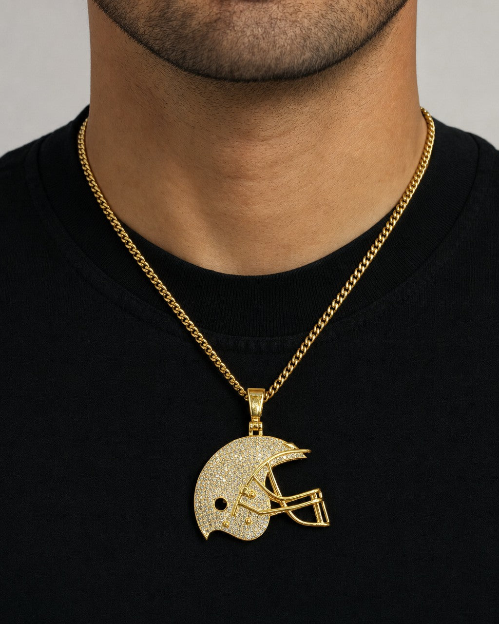 Male model wearing 10K Football Helmet Diamond Pendant
