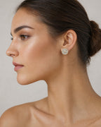 Female model wearing 14K Sunshine Circle Diamond Earrings