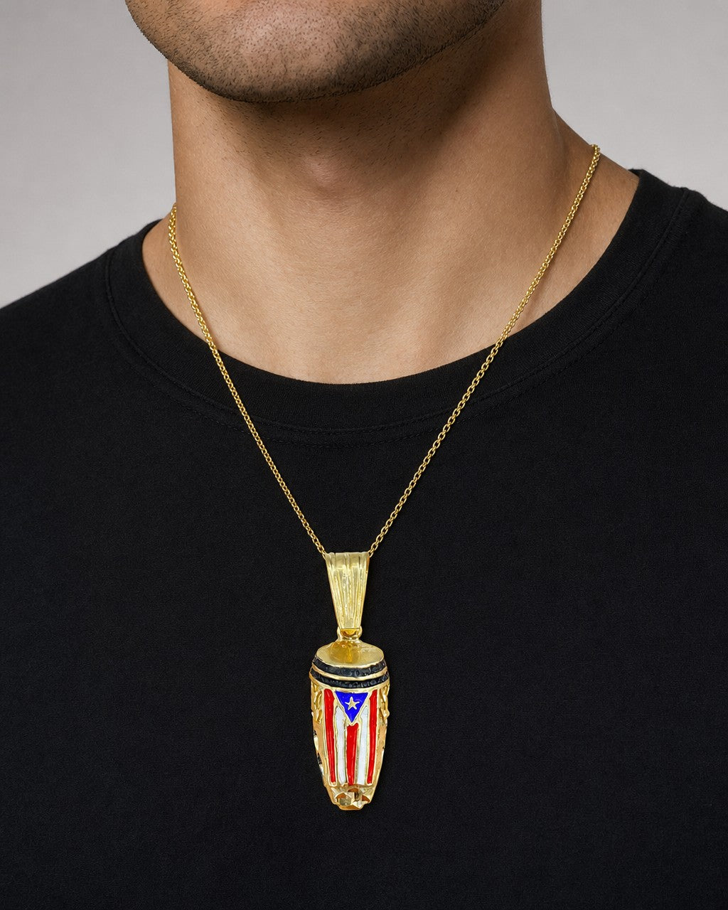 Male model wearing 10K Pendaro Puerto Rico Pendant