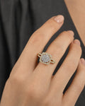Female model wearing 14K Circle Square Halo Diamond Ring