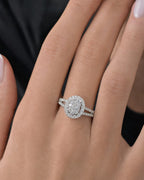 Female model wearing 14K Oval Halo Diamond Ring