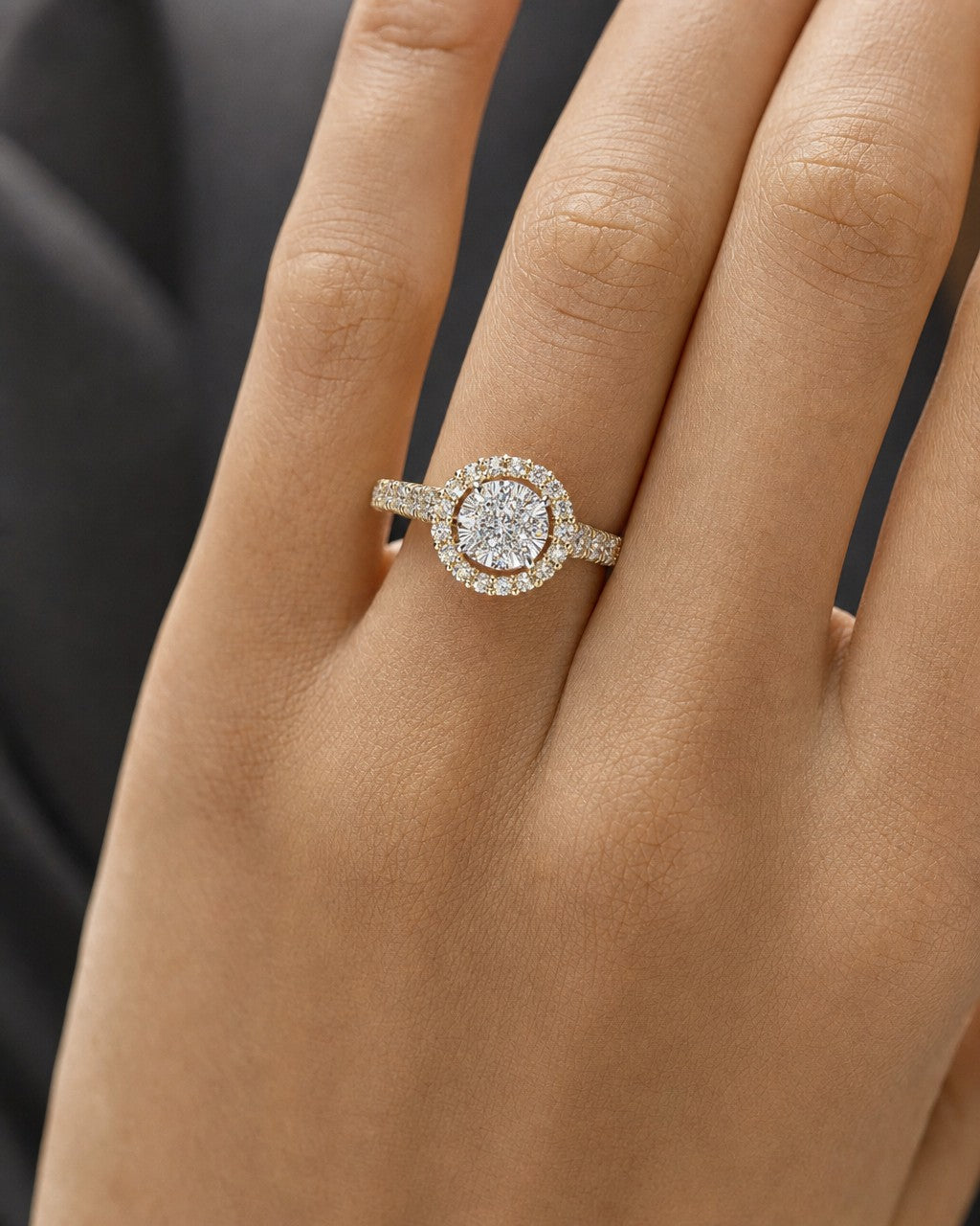 Female model wearing 14K Circle Halo Diamond Ring