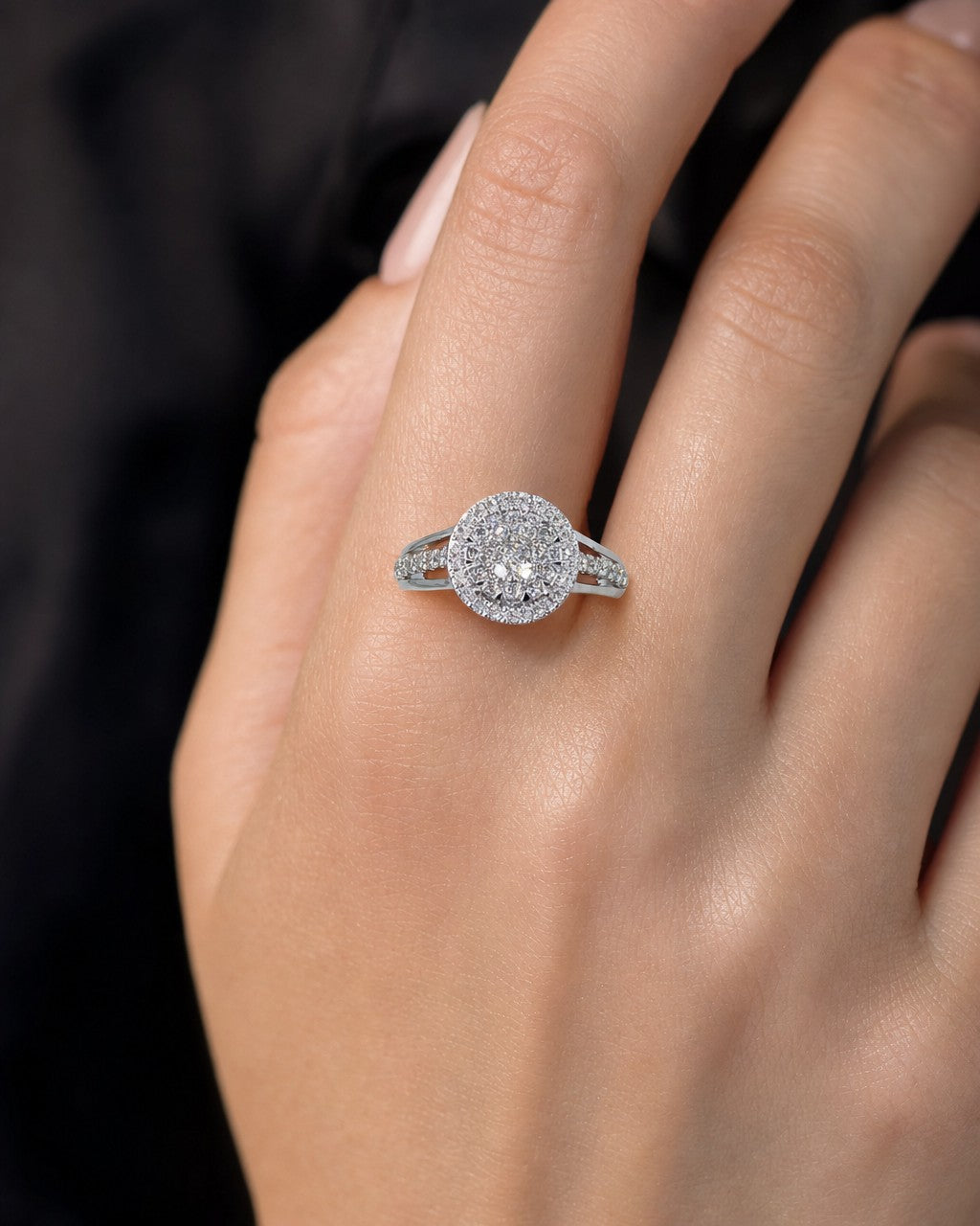 Female model wearing 14K Circle Halo Diamond Ring