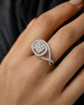 Female model wearing 14K Square Halo Twist Diamond Engagement Ring