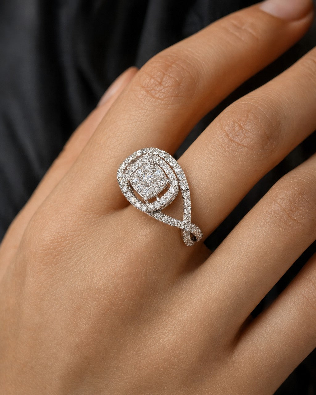 Female model wearing 14K Square Halo Twist Diamond Engagement Ring