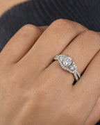 Female model wearing 14K Three Stone Halo Diamond Engagement Ring