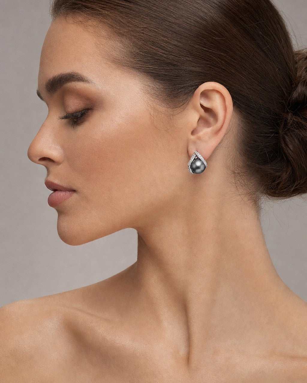 Female model wearing 18K Tahitian Pearl Earrings