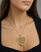 Female model wearing 10K Heart Halo Diamond Photo Pendant