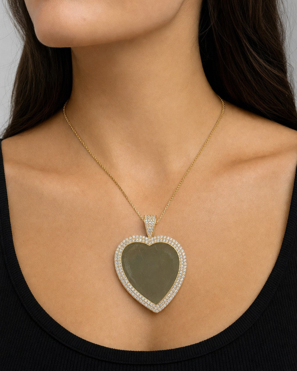 Female model wearing 10K Double Halo Heart Photo Pendant