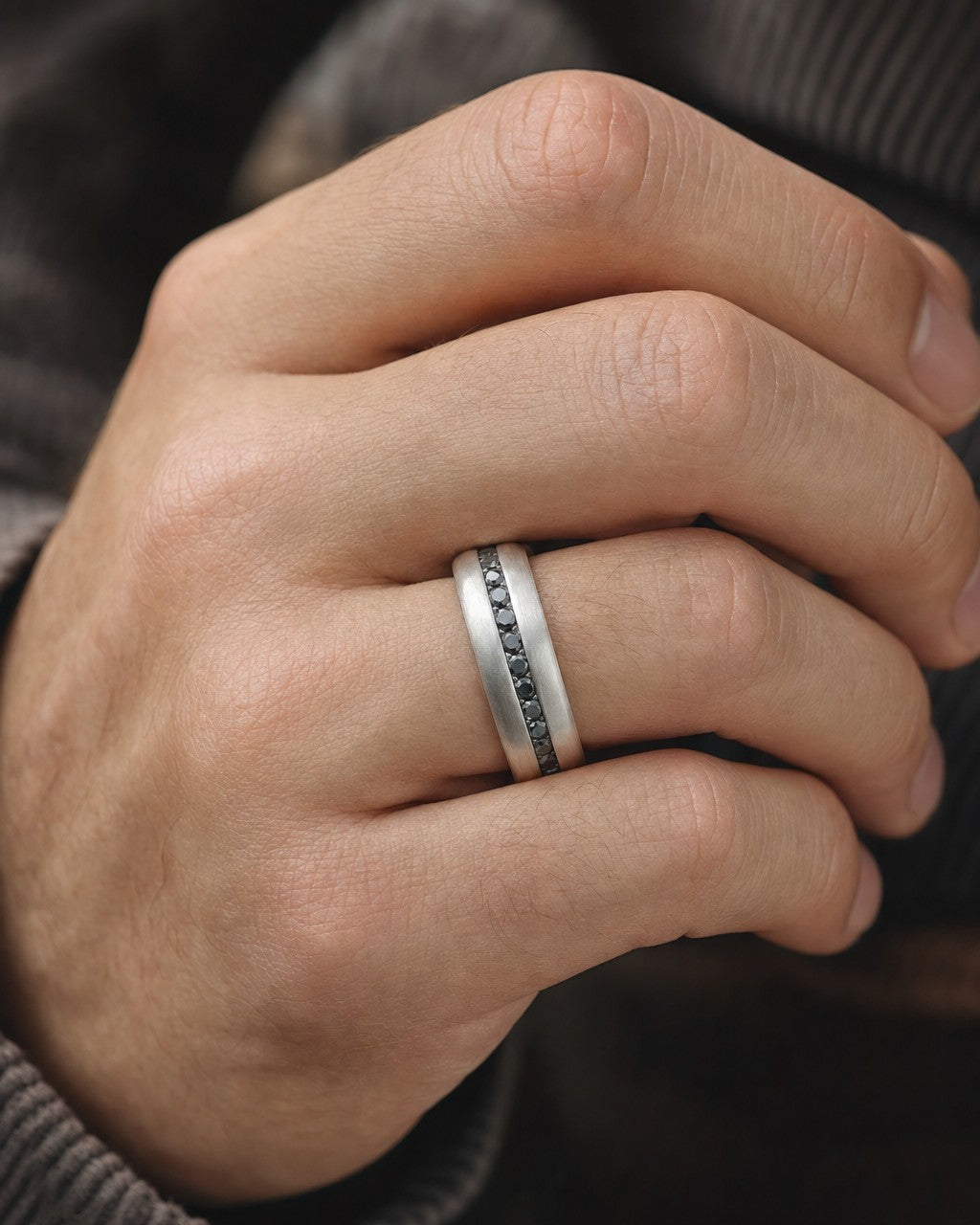 Male model wearing Platinum Kane Black Diamond Band Ring