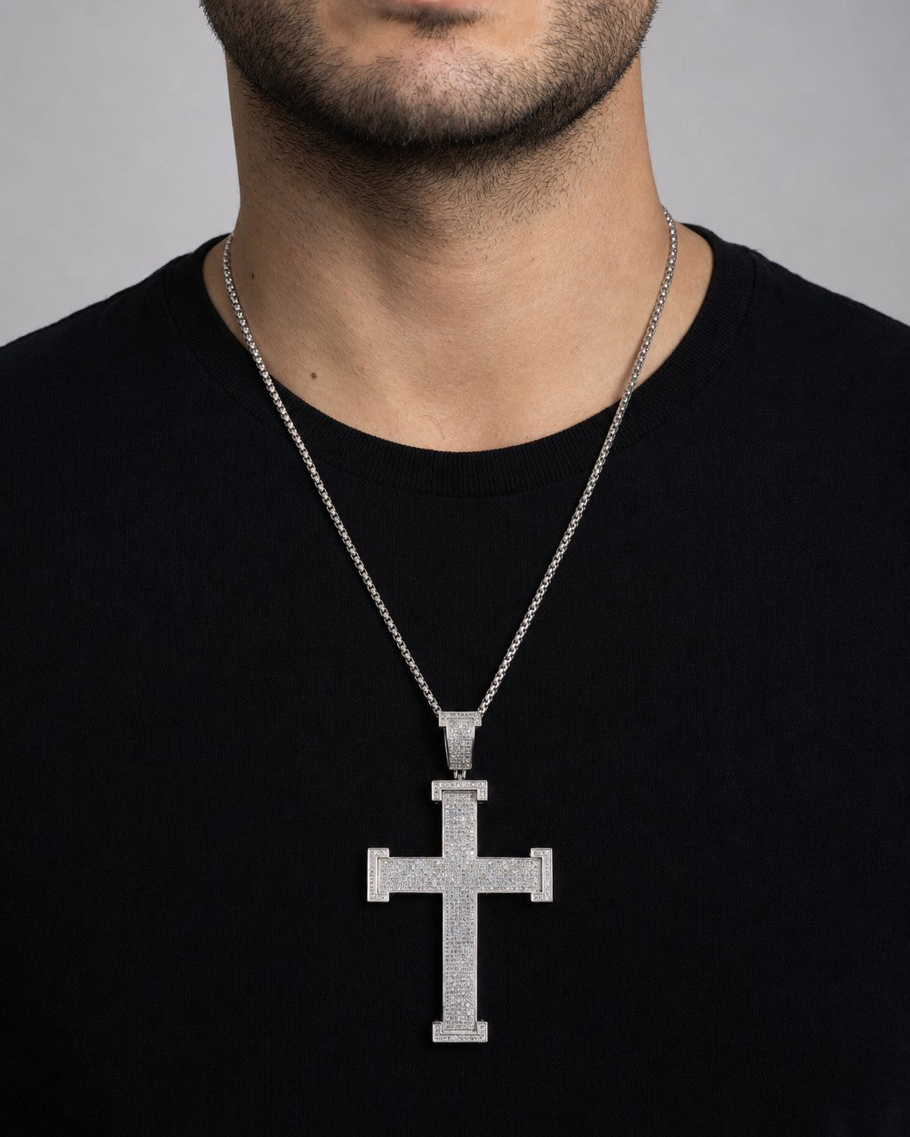 Male model wearing 10K Virtue Cross Diamond Pendant