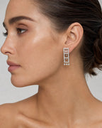Female model wearing 18K Chandelier Diamond Earrings