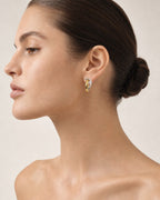 Female model wearing 18K Divine Two-Tone Diamond Earrings