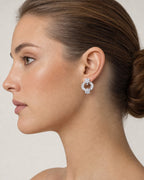 Female model wearing 18K Stardust Diamond Baguette Earrings