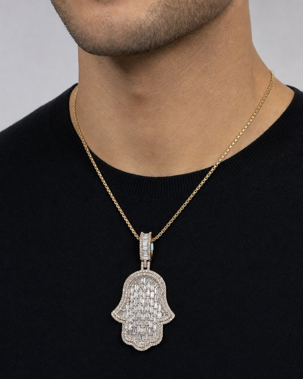 Male model wearing 14K Hamsa Emerald Cut Diamond Pendant