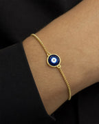Male model wearing 14K Evil Eye Adjustable Bracelet