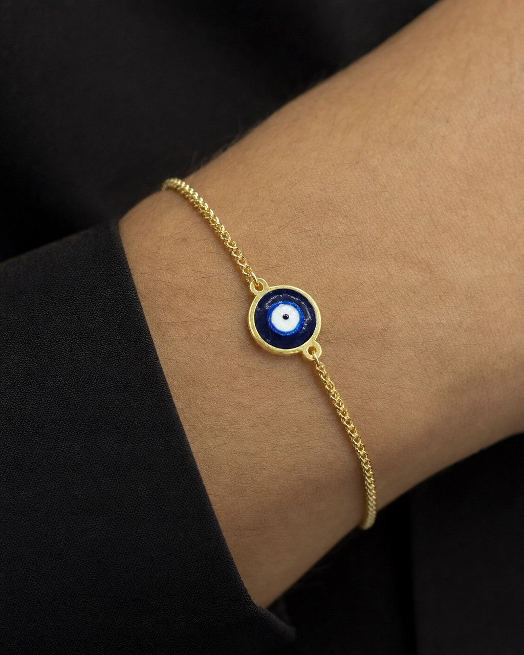 Male model wearing 14K Evil Eye Adjustable Bracelet