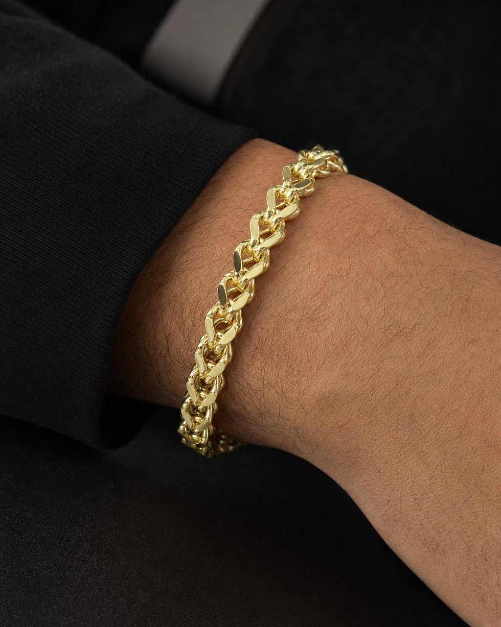 Male model wearing 14K 6.3MM Franco Box Cuban Link Bracelet 8.5"