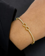 Male model wearing 10K Infinity Tennis Bracelet 7"