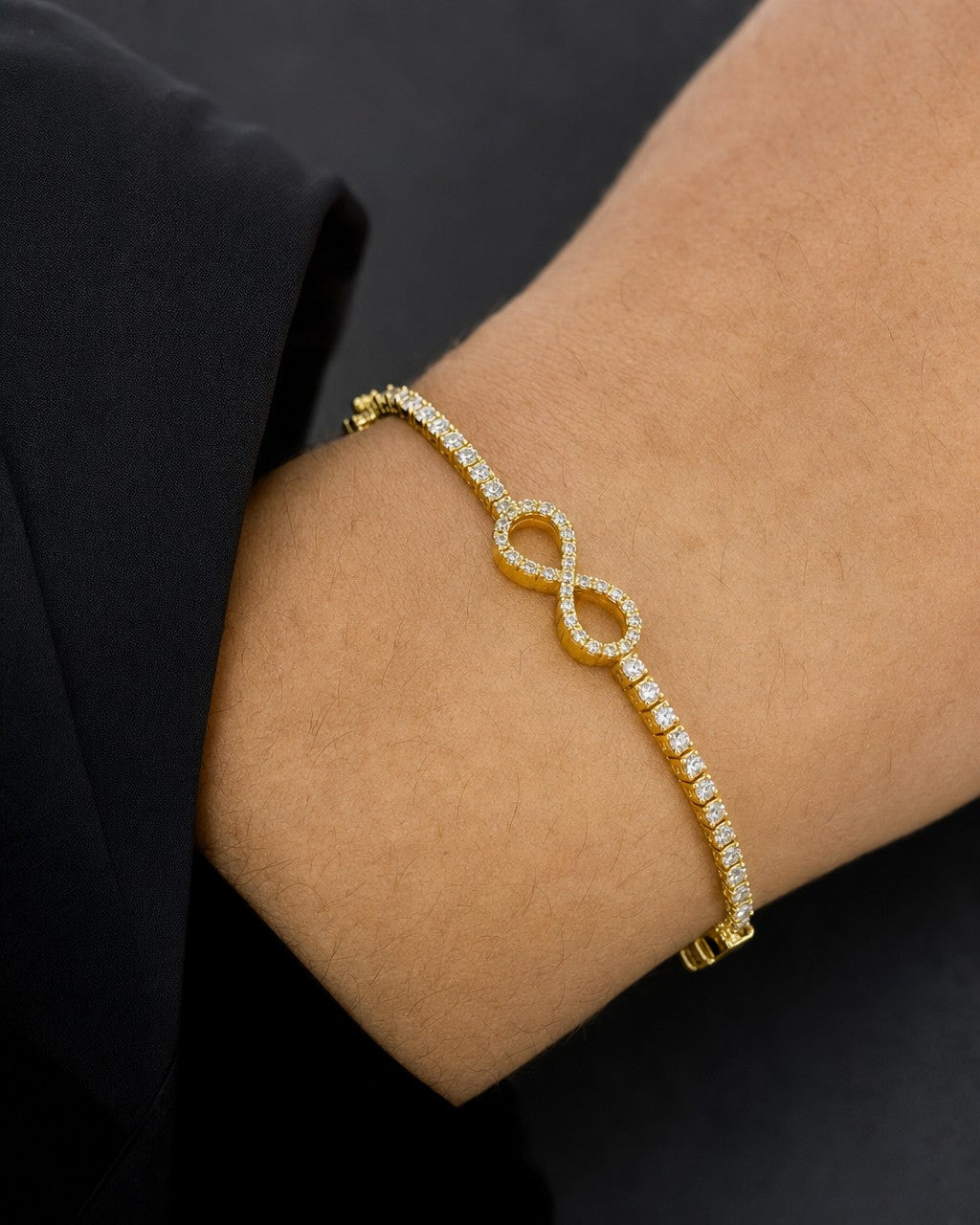 Male model wearing 10K Infinity Tennis Bracelet 7"