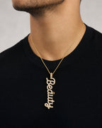 Male model wearing 10K Beauty Plate Diamond Pendant