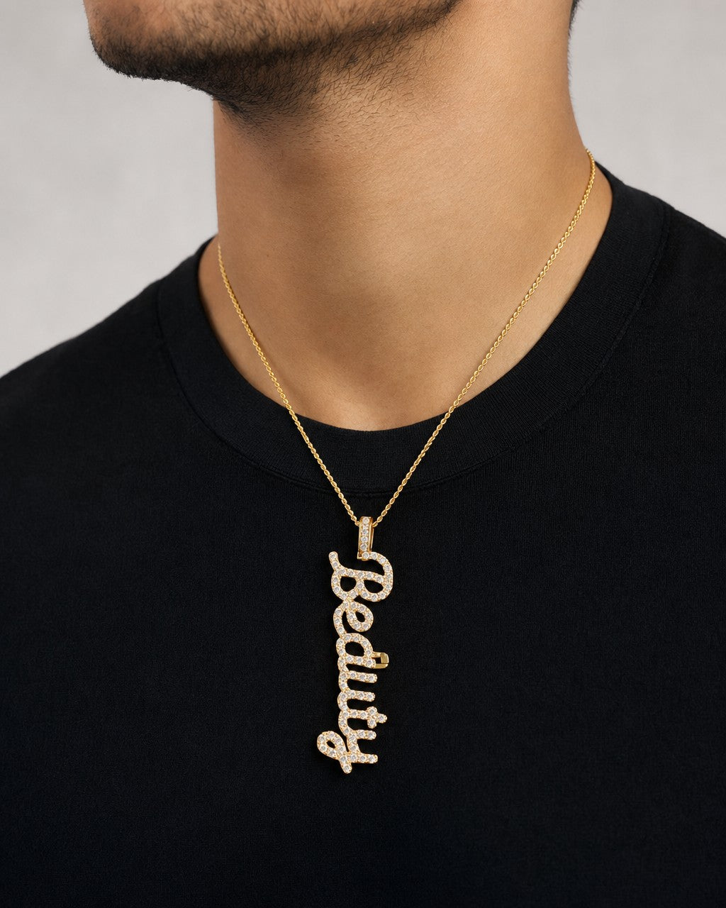 Male model wearing 10K Beauty Plate Diamond Pendant