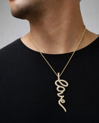 Male model wearing 10K Love Script Diamond Pendant